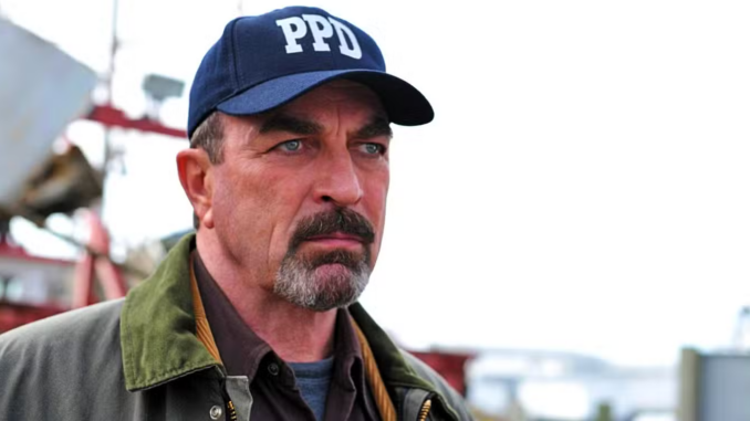 Tom selleck as jesse stone in a ballcap looking intense